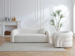 Sofá 3 plazas y sillón giratorio en tela bouclé LAPIOTA de < Maison Céphy